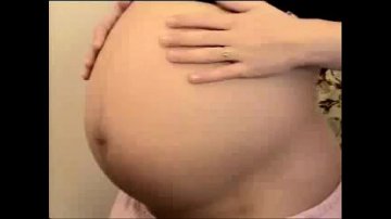 pregnant woman feels sexy starts touching huge belly naughty breasts